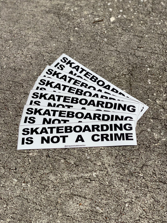 SKATEBOARDING IS NOT A CRIME Sticker